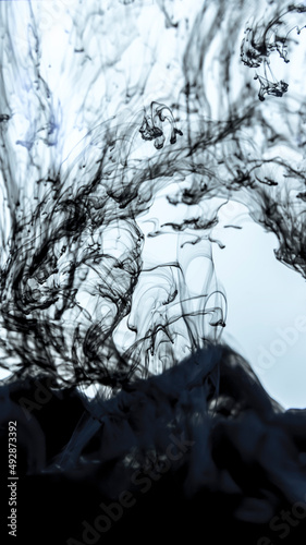 monochrome smoky effect ink in water black and white photo