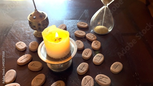 Candle with Runes and Hourglass