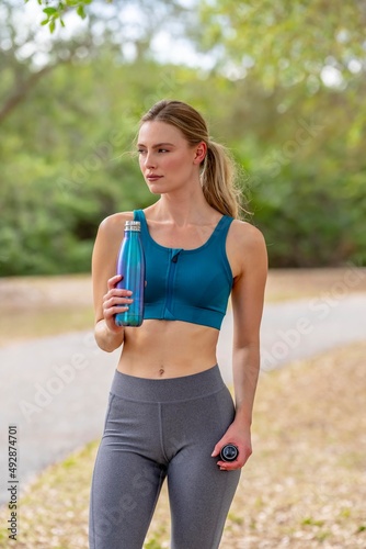 Lovely Blonde Model Enjoying A Summers Day While Preparing To Workout