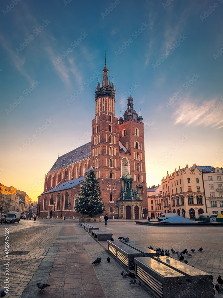 KRAKOW, POLAND, 7 JANUARY 2022:  Amazing sunset over St Mary Basilica
