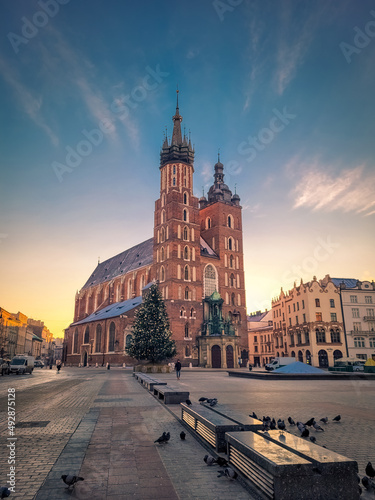 KRAKOW, POLAND, 7 JANUARY 2022: Amazing sunset over St Mary Basilica