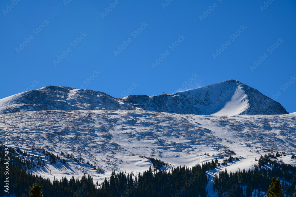 Beautiful view to Breckenridge Resort peak, Colorado. Sunny day with clear blue sky.
