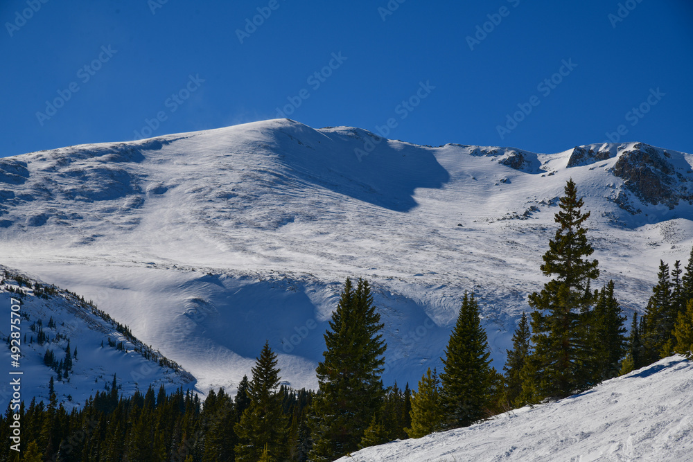 Beautiful view to Breckenridge Resort peak, Colorado. Sunny day with clear blue sky.