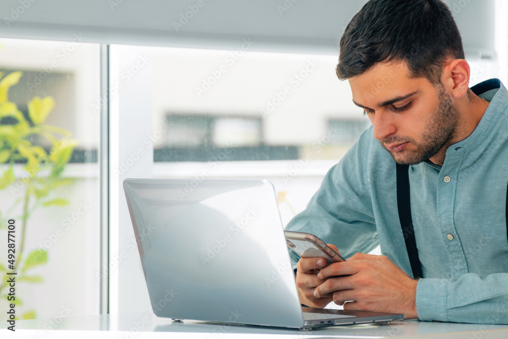 businessman with mobile phone or smartphone and computer businessman with mobile phone or smartphone and computer