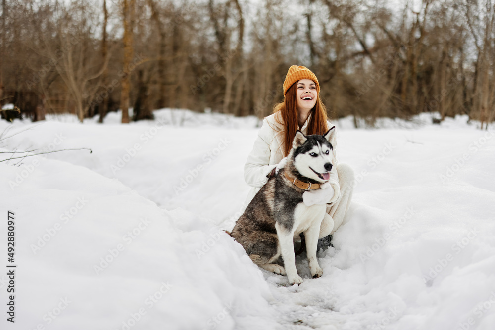 young woman with husky winter walk outdoors friendship Lifestyle