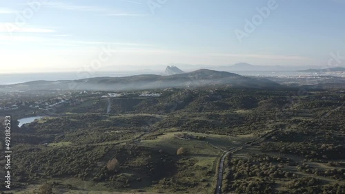 drone flying trvelinng looking a gibraltar rock and the sea spain and morroco