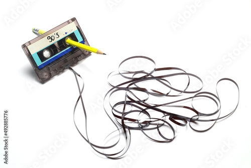 A pen for rewind cassette tape compact retro on white background. 90's concepts. 