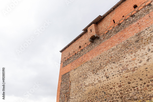 Canvas Print brick wall of an old castle with toilet room