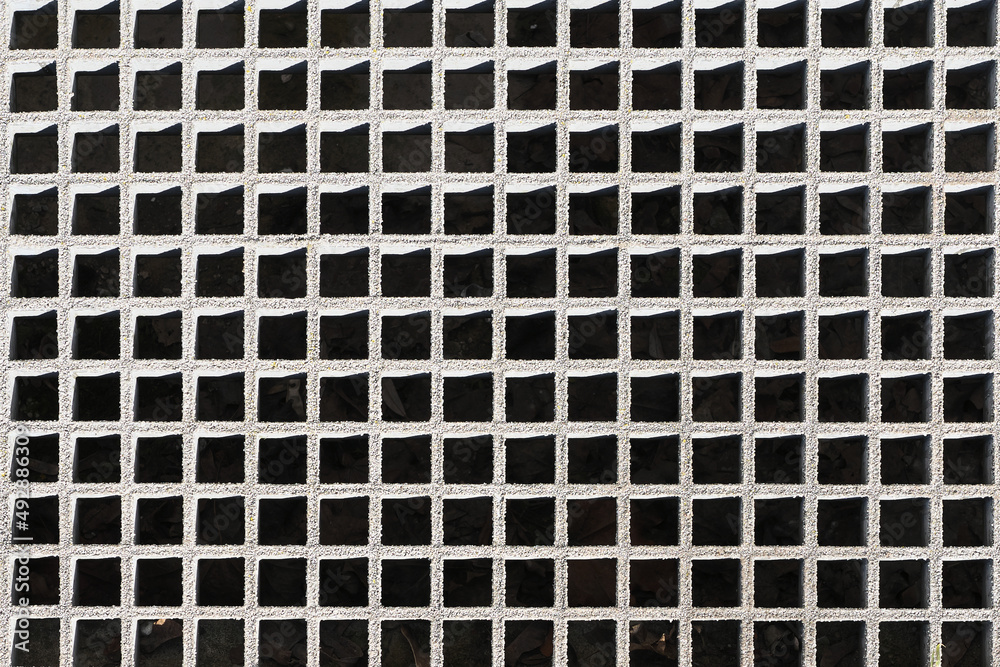 Geometric background. Gray metal grille. Geometric background. Gray metal grille.