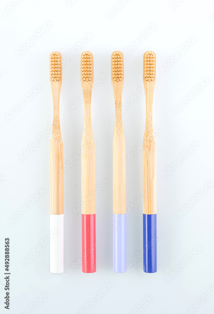wooden toothbrushes on white background wooden toothbrushes on white background