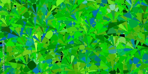 Dark Blue, Yellow vector background with polygonal forms.