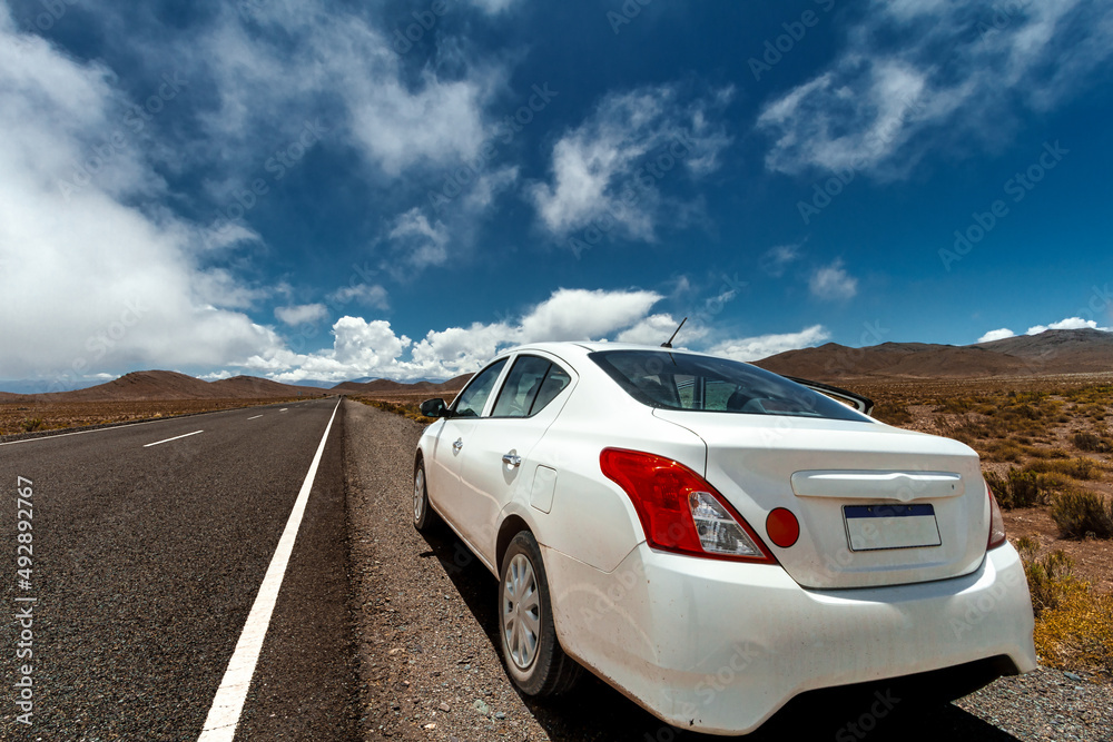 Naklejka premium Car stopped on the straight line of Tin Tin in Salta, Argentina