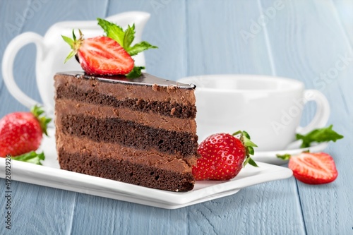 Tasty cake chocolate slice on a plate