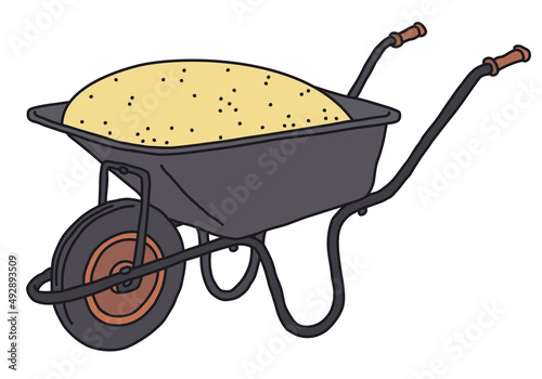 The vectorized hand drawing of a black hand barrow with a sand photo