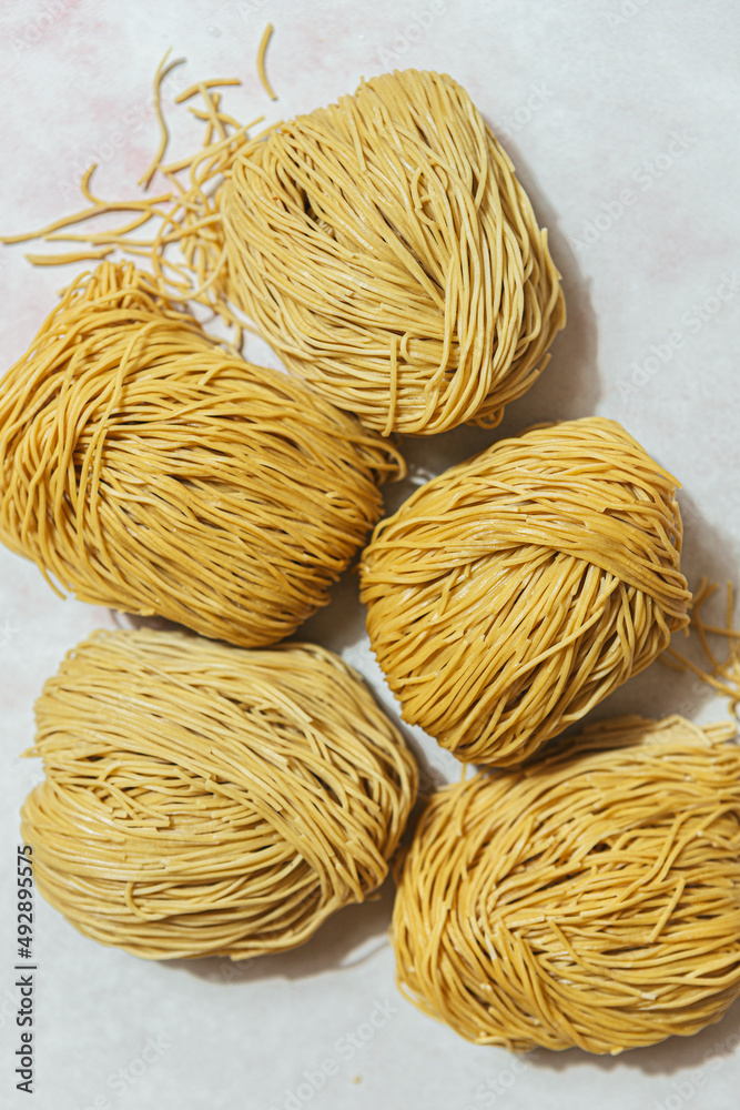 close up of egg noodles close up of egg noodles