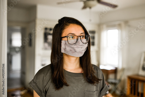 Homemade cloth face mask on woman photo