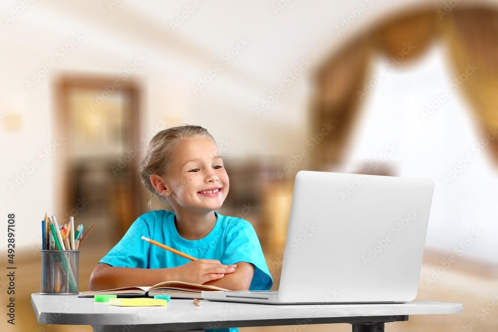 Distance education. Smiling child studying online at home, Distance education. Smiling child studying online at home,