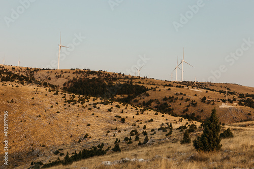 Clean Energy Windmills On A Hill photo