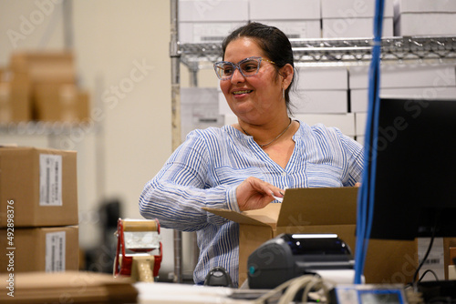 Portrait of Laughing  worker at Warehouse workplace  photo