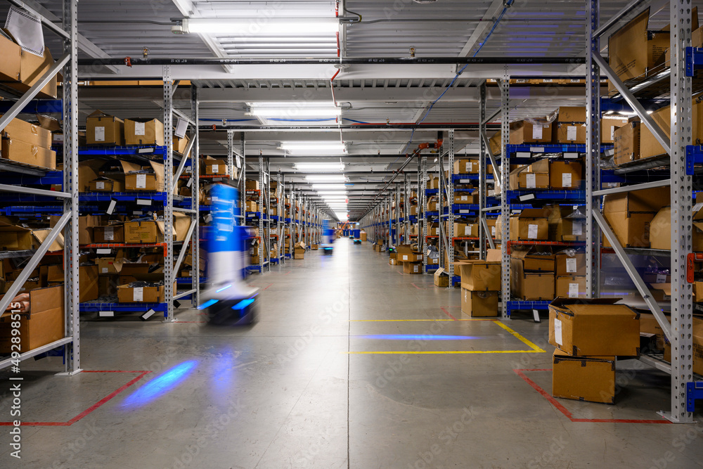 Robots on floor at Warehouse of E-Commerce shipment center 