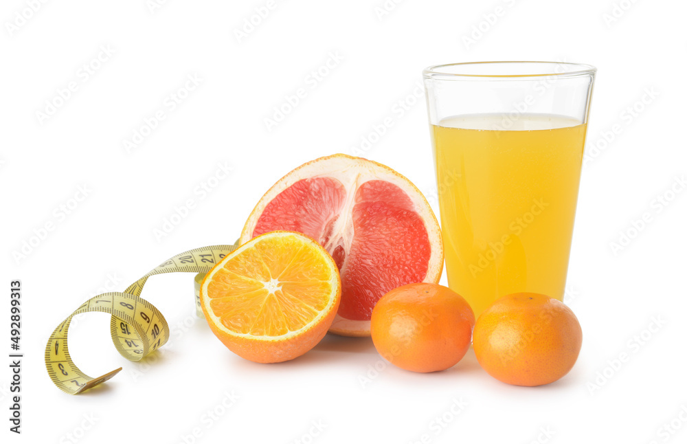 Glass of juice, citrus fruits and measuring tape on white background Glass of juice, citrus fruits and measuring tape on white background
