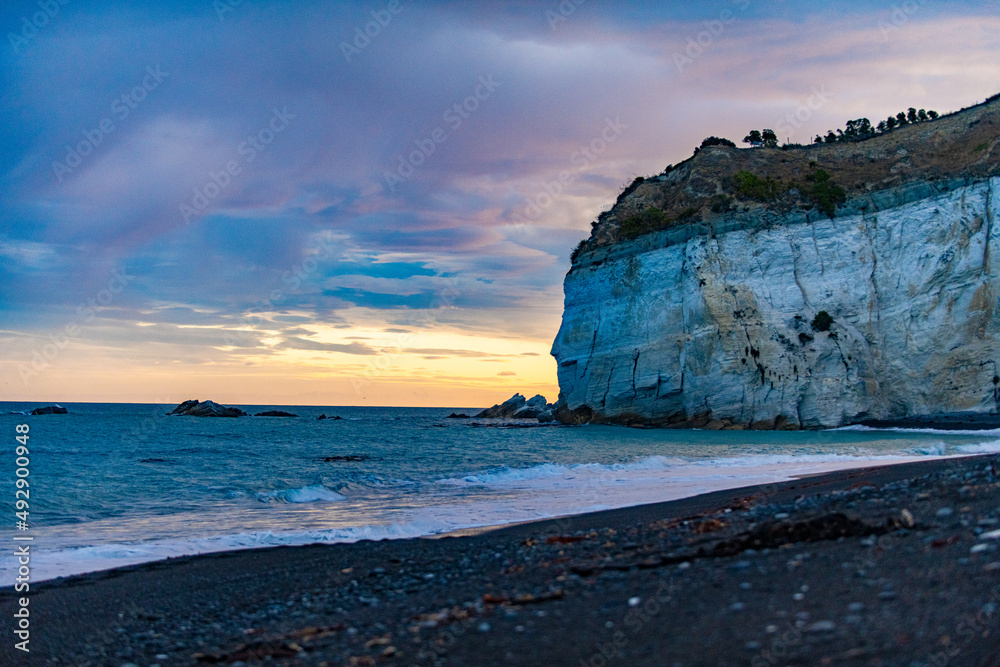 Cliffs near the ocean during sunset