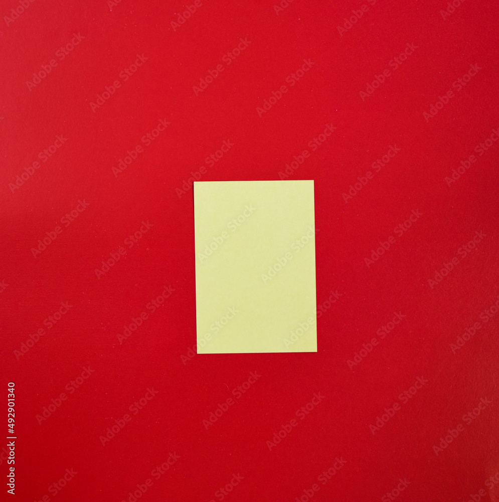 Colorful note papers over a red background. Reminder paper Colorful note papers over a red background. Reminder paper