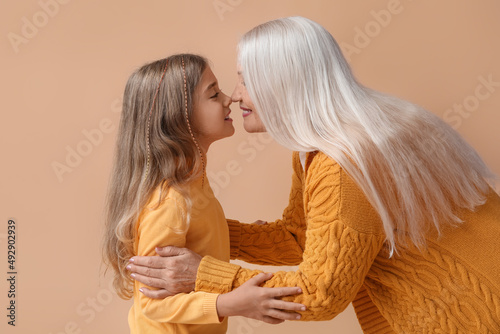 Little girl with her grandm...