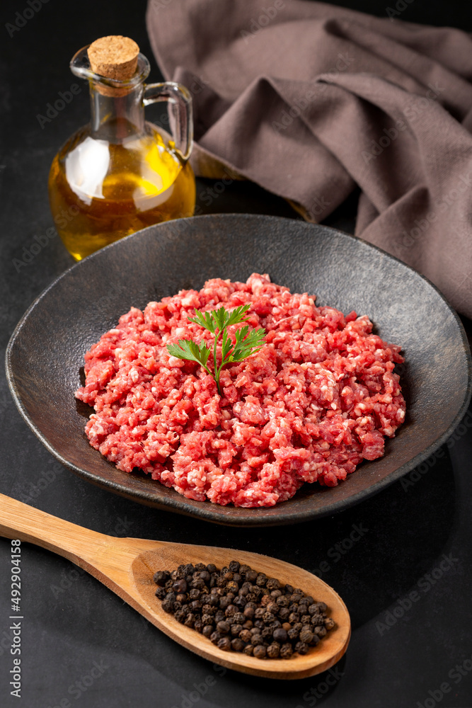 Raw ground beef ready for preparation. Raw ground beef ready for preparation.