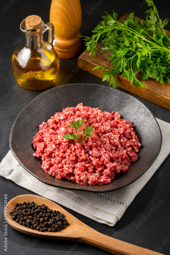 Raw ground beef ready for preparation. Raw ground beef ready for preparation.