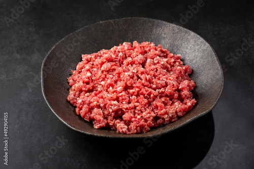 Raw ground beef ready for preparation.
