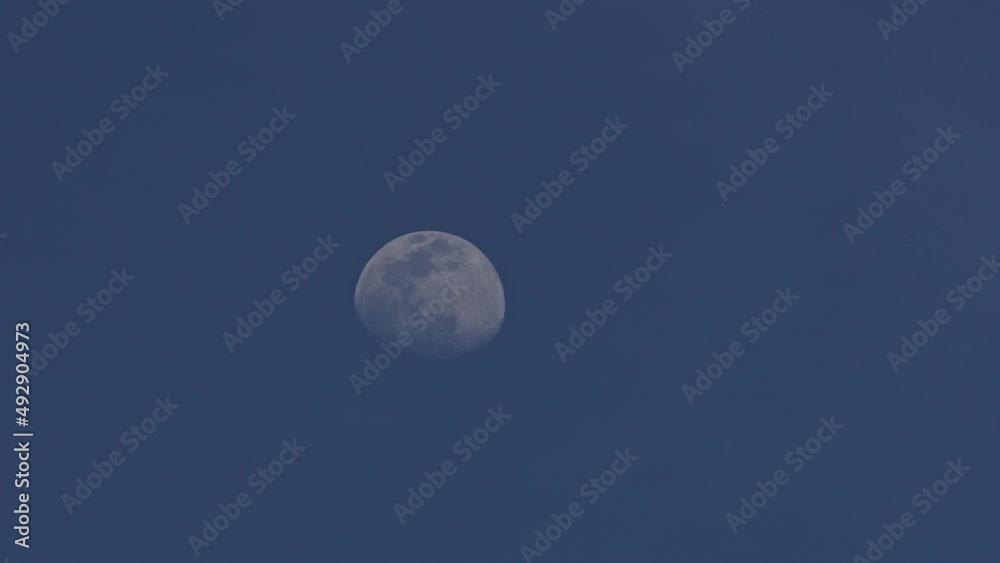 Passenger plane flying past moon. Passenger plane flying past moon.