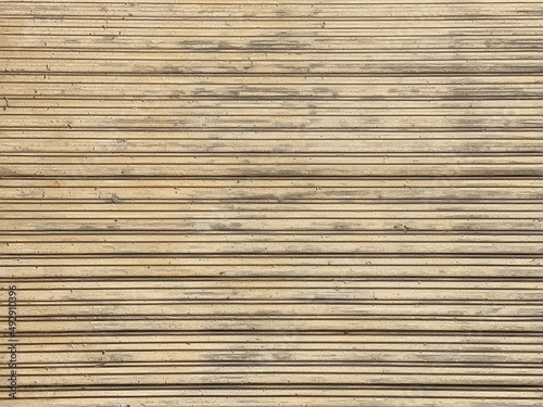 Texture of lines on a light wooden surface