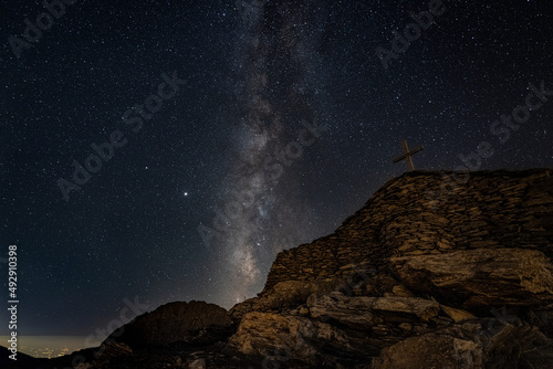 The milkyway galaxy over Olympos mountain, from different angles. Hiking at night to explore wanderfull views. photo