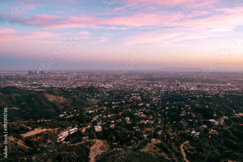 Photos Colorful Sunset over Los Angeles Skyline seen from Griffith Park, California