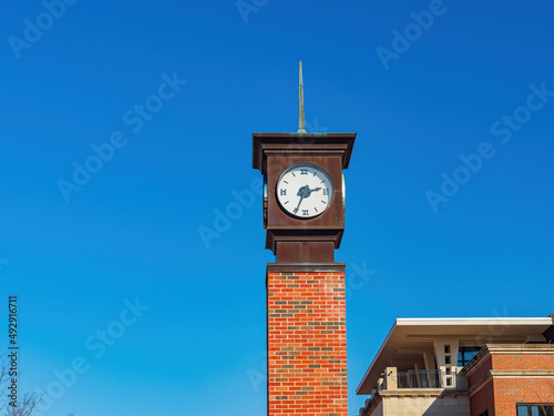 Sunny exteior view of the clock tower of Oklahoma State University photo