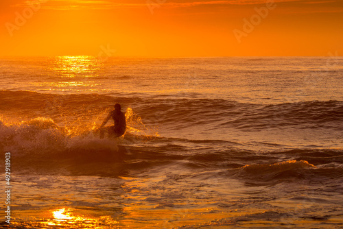 Surfing at Sunrise © Zach