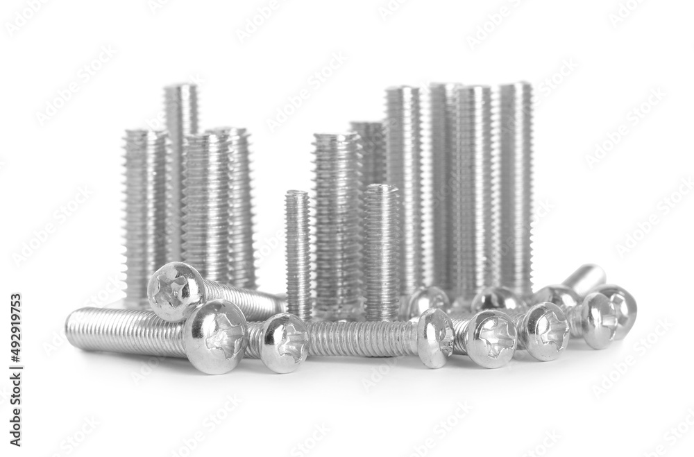 Many different metal bolts on white background Many different metal bolts on white background