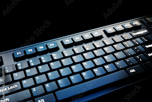 Computer keyboard on black background. 3D rendering of streaming gear and gamer workspace concept