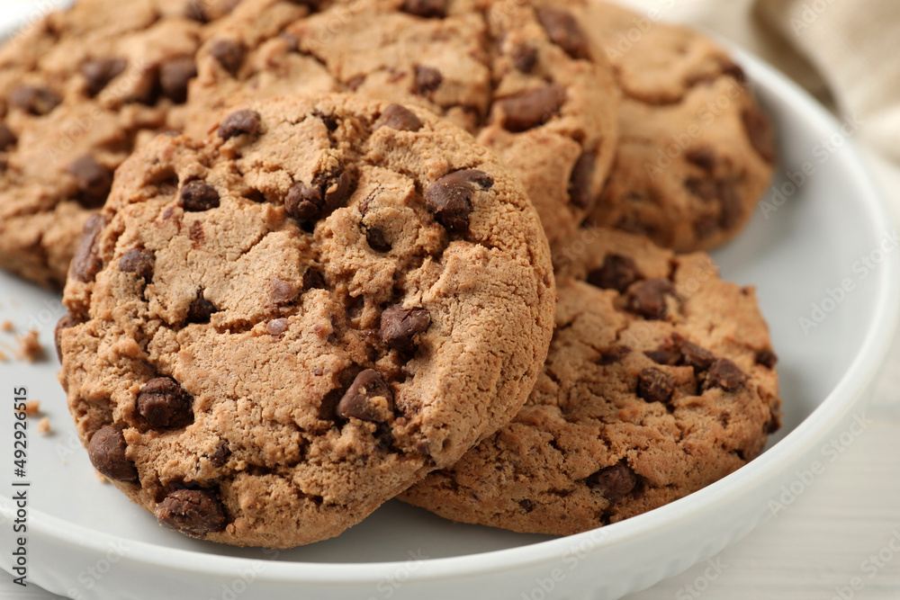 Delicious chocolate chip cookies on plate, closeup Delicious chocolate chip cookies on plate, closeup
