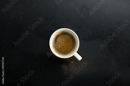 cup of coffee on black table in cafe