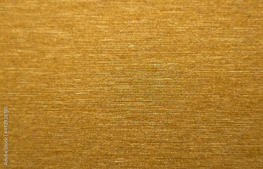 Photo texture of gold. Golden background for text. Chrome yellow background. The color of gilding. Photo texture of gold. Golden background for text. Chrome yellow background. The color of gilding.