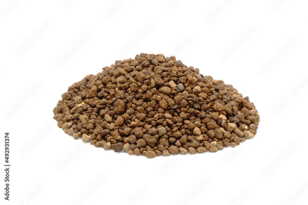 Akadama soil isolated on white background. Akadama is a naturally occurring, granular clay-like mineral used as soil for bonsai trees, cactus, succulent and other container-grown plants. Akadama soil isolated on white background. Akadama is a naturally occurring, granular clay-like mineral used as soil for bonsai trees, cactus, succulent and other container-grown plants.
