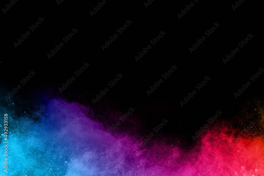 abstract colored dust explosion on a black background.abstract powder splatted background,Freeze motion of color powder exploding/throwing color powder, multicolored glitter texture. abstract colored dust explosion on a black background.abstract powder splatted background,Freeze motion of color powder exploding/throwing color powder, multicolored glitter texture.