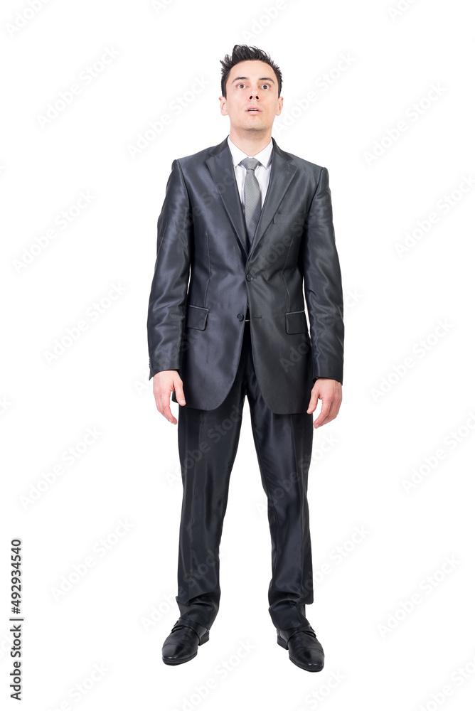 Shocked businessman in suit in studio. White background. Shocked businessman in suit in studio. White background.