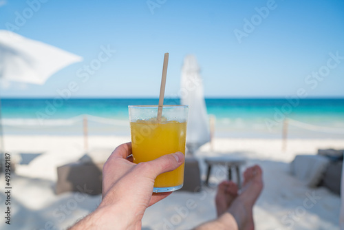 Having drink on the beach