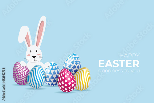 Easter greeting with bunny and egg on light blue background.