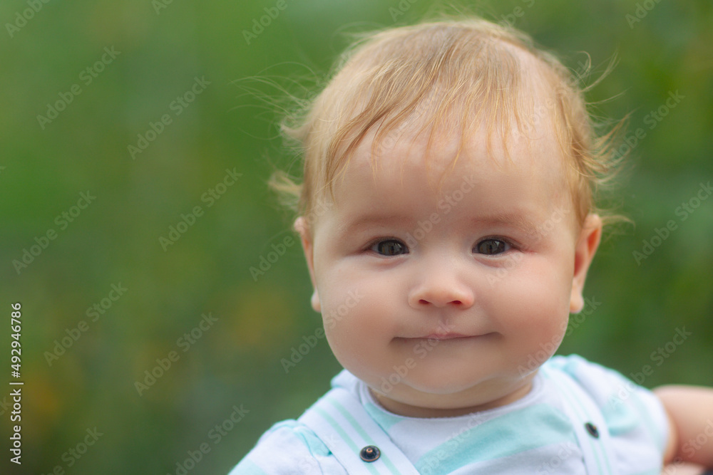 Portrait of a little baby boy face outdoor. Portrait of a little baby boy face outdoor.