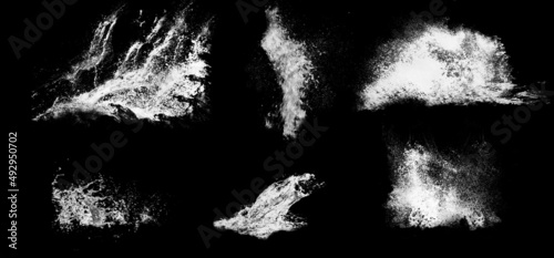 Water splashes. Big breaking ocean waves isolated on black background