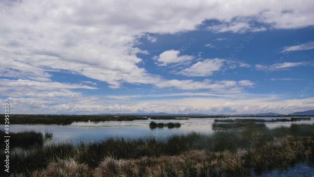 Floating Through The Reeds On Lake Titicaca, Peru Floating Through The Reeds On Lake Titicaca, Peru